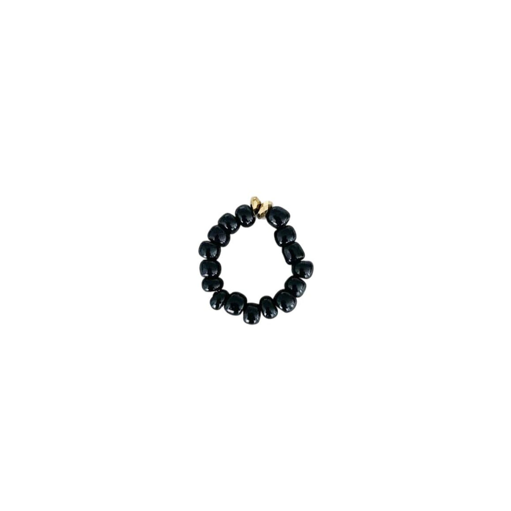 Bague de la marque Margotte, en perle de rocaille en verre, coloris noir et doré.