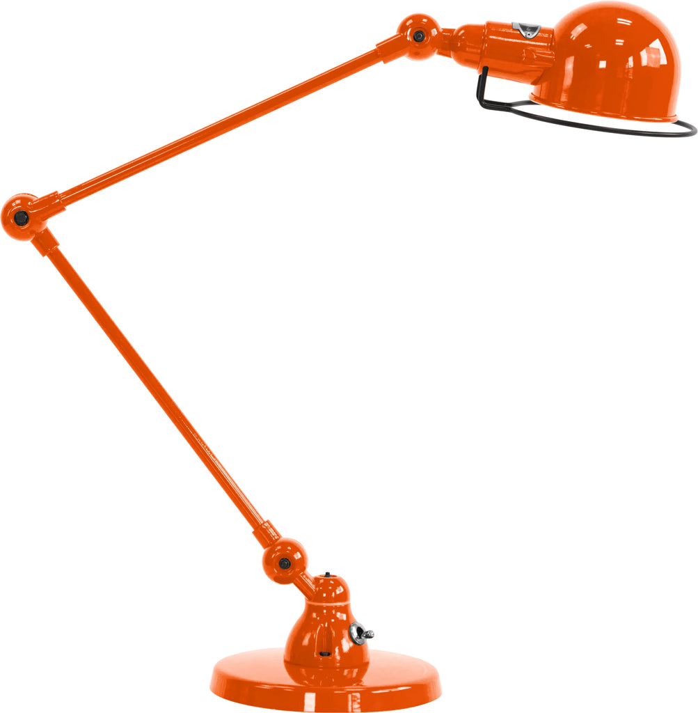 Lampe à poser signal de la marque Jieldé, au design intemporel, disponible dans 28 couleurs. Coloris Orange Brillant.