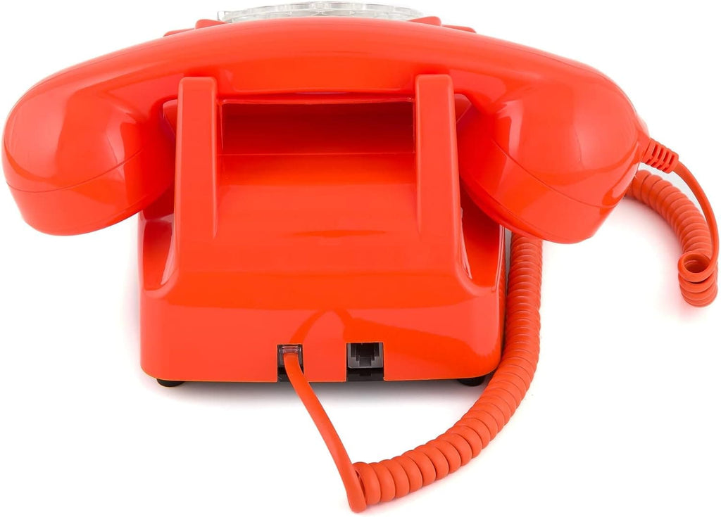 Téléphone fixe rotatif de la marque GPO, des années 60 et 70, en plastique. Coloris Orange.