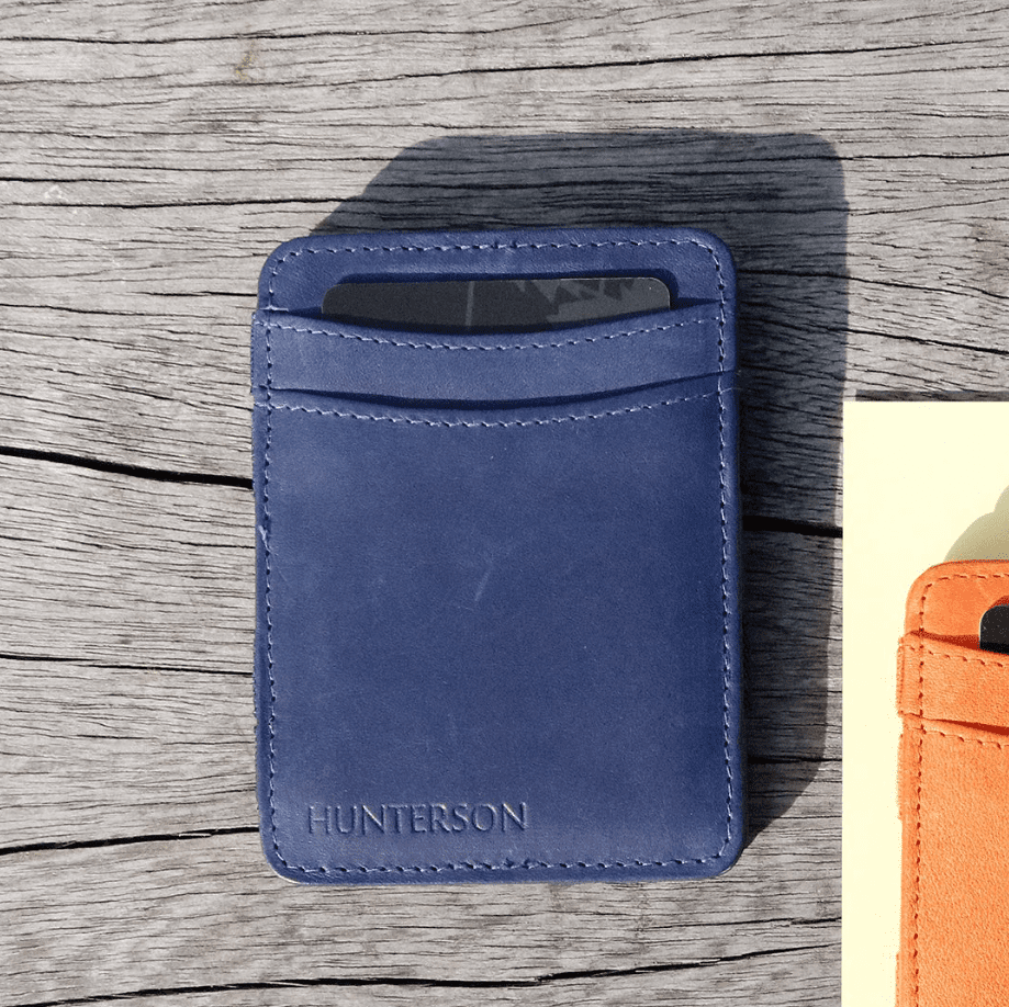Portefeuille magique de la marque Hunterson, en cuir véritable, léger et élégant. Coloris Bleu.