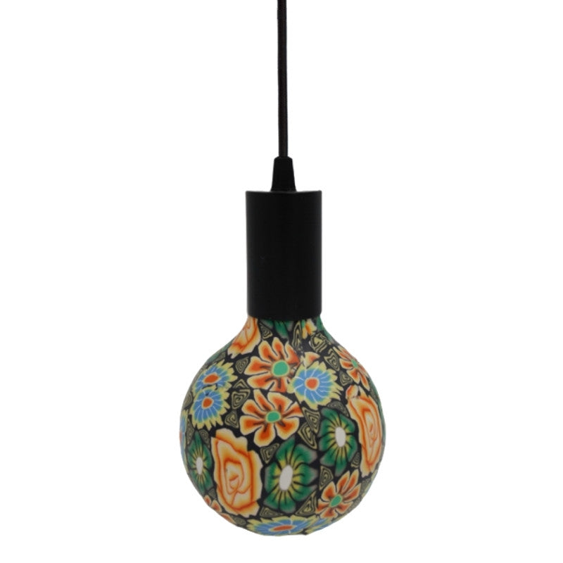 Une ampoule fleuries Nexel à filament LED en verre et en céramique. Code de l'ampoule P033.